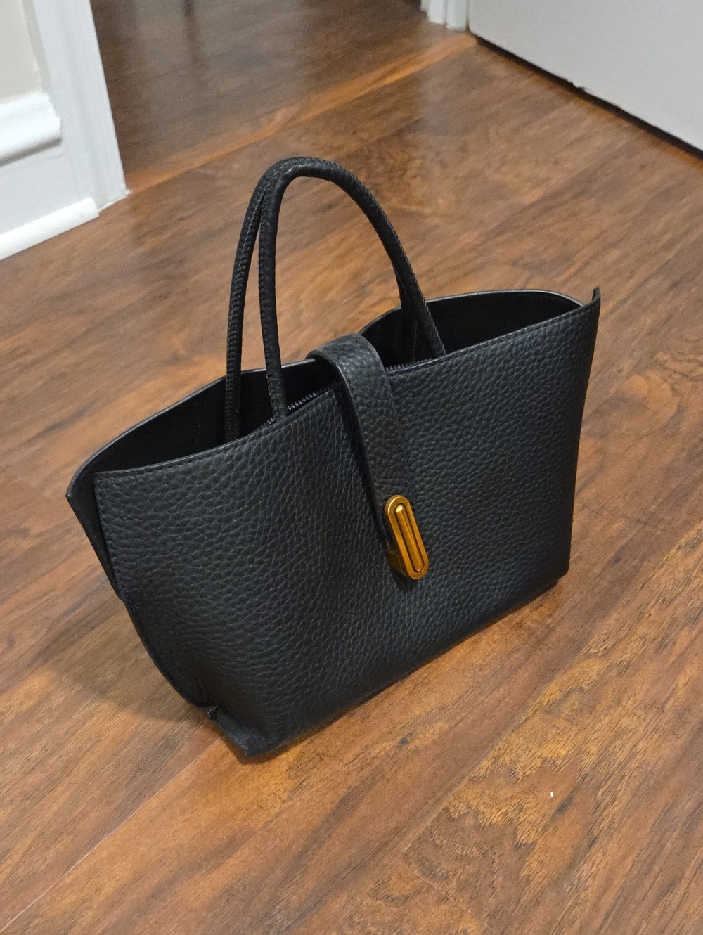Elegant Black Pebbled Tote with Gold Accent
